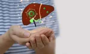 Dłonie trzymają model wątroby, na którym przez lupę widać wirusa B, symbolizującego zapalenie wątroby.